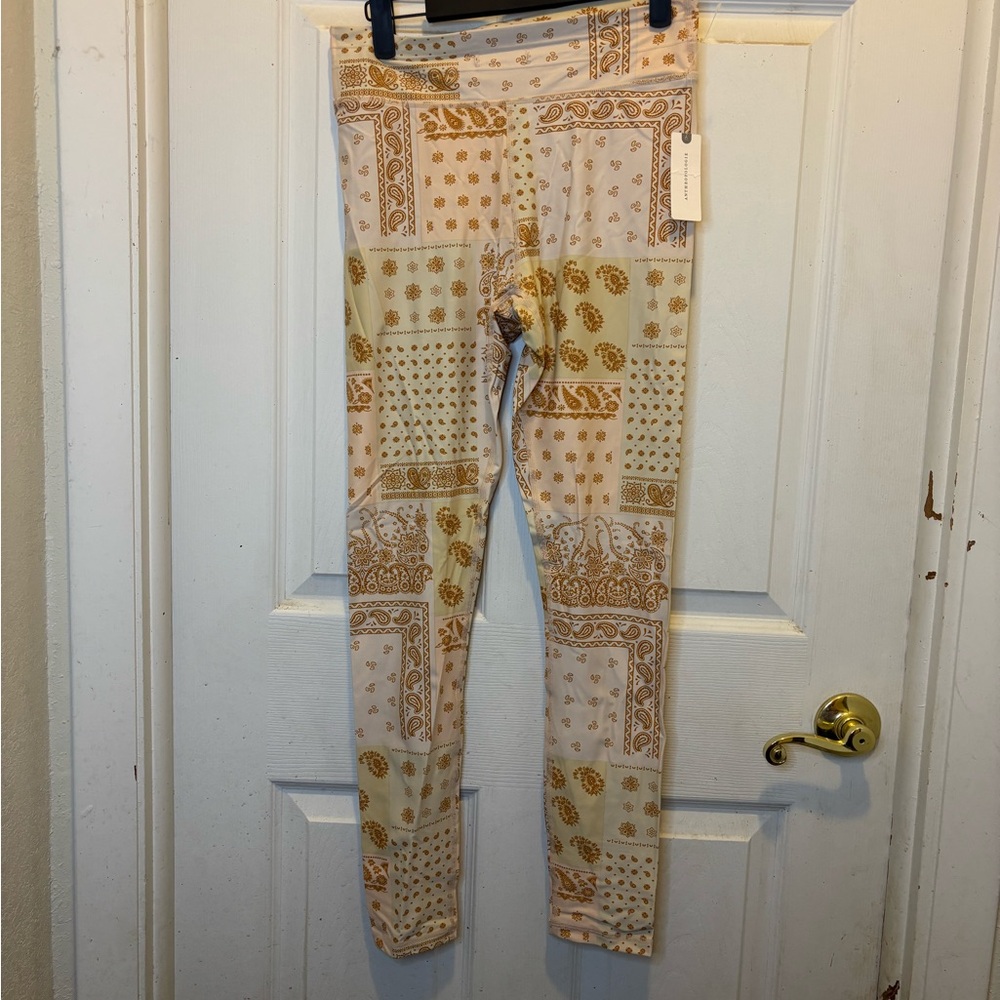 The Upside Anthropologie Cream and Gold Patterned Bandana Yoga Pant Leggings